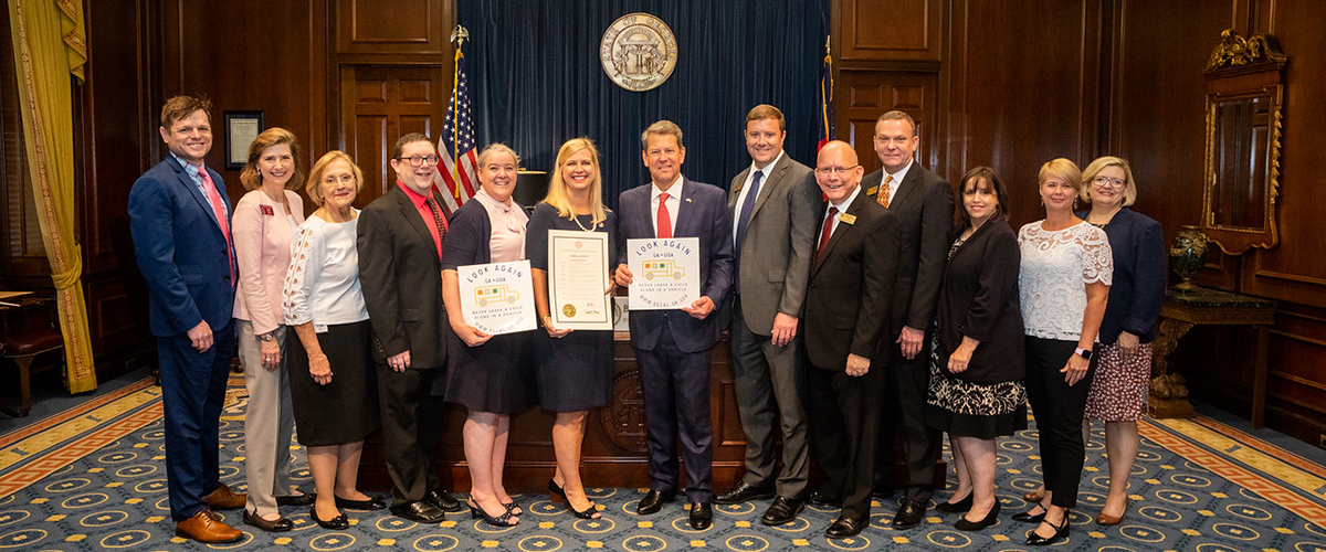 Governor Brian Kemp and Decal Executives